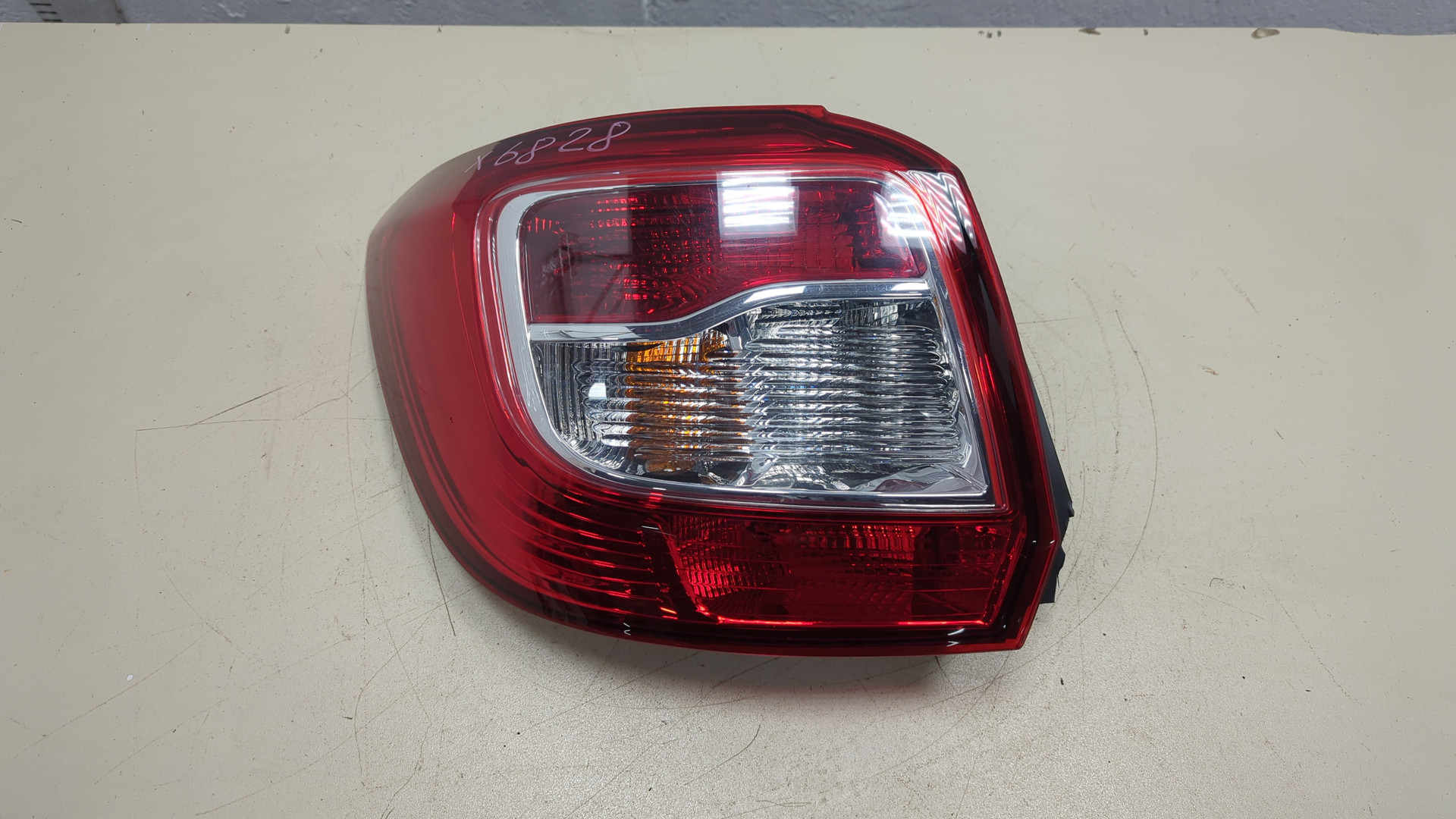 Фонарь задний левый