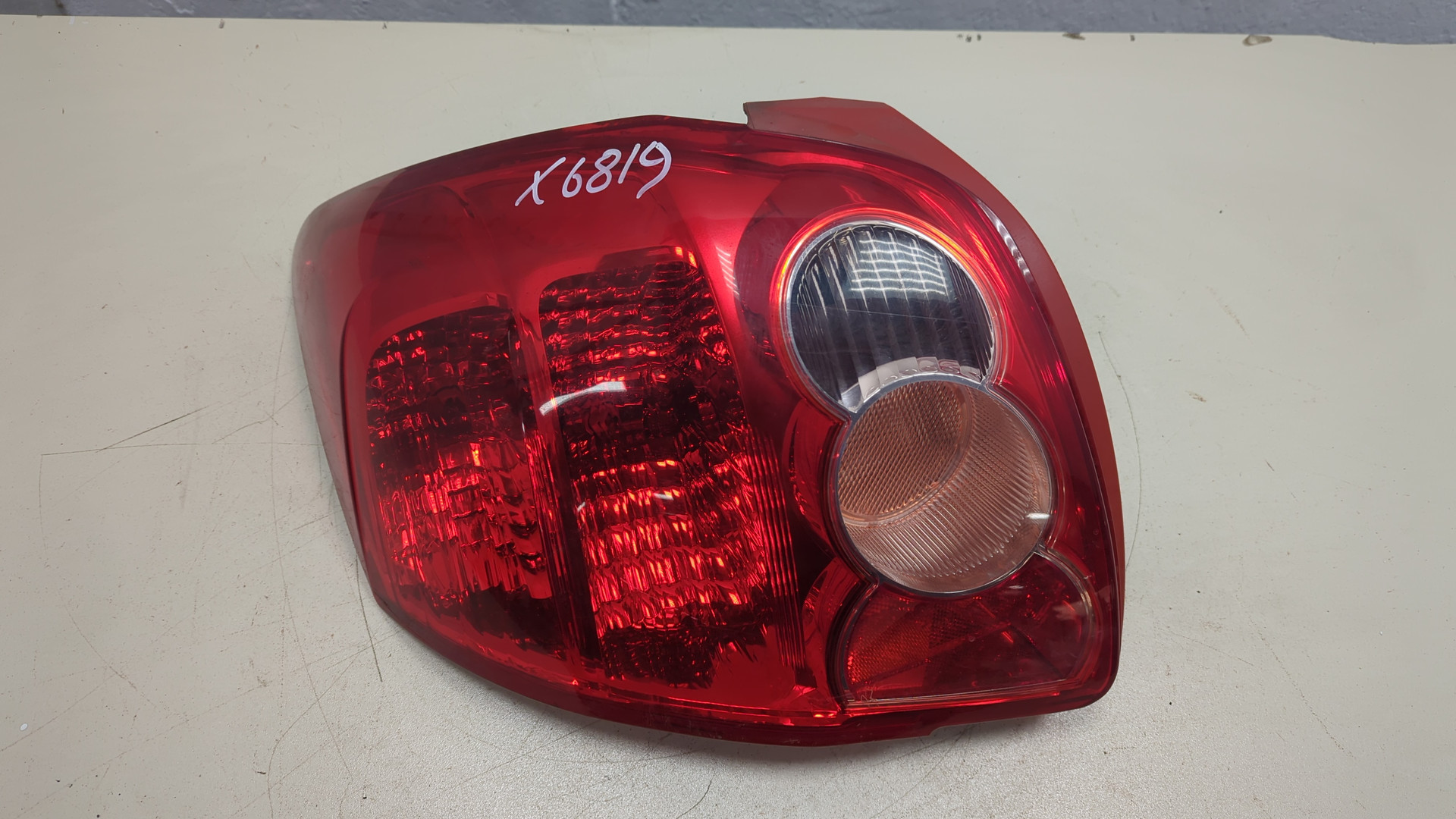 Фонарь задний левый