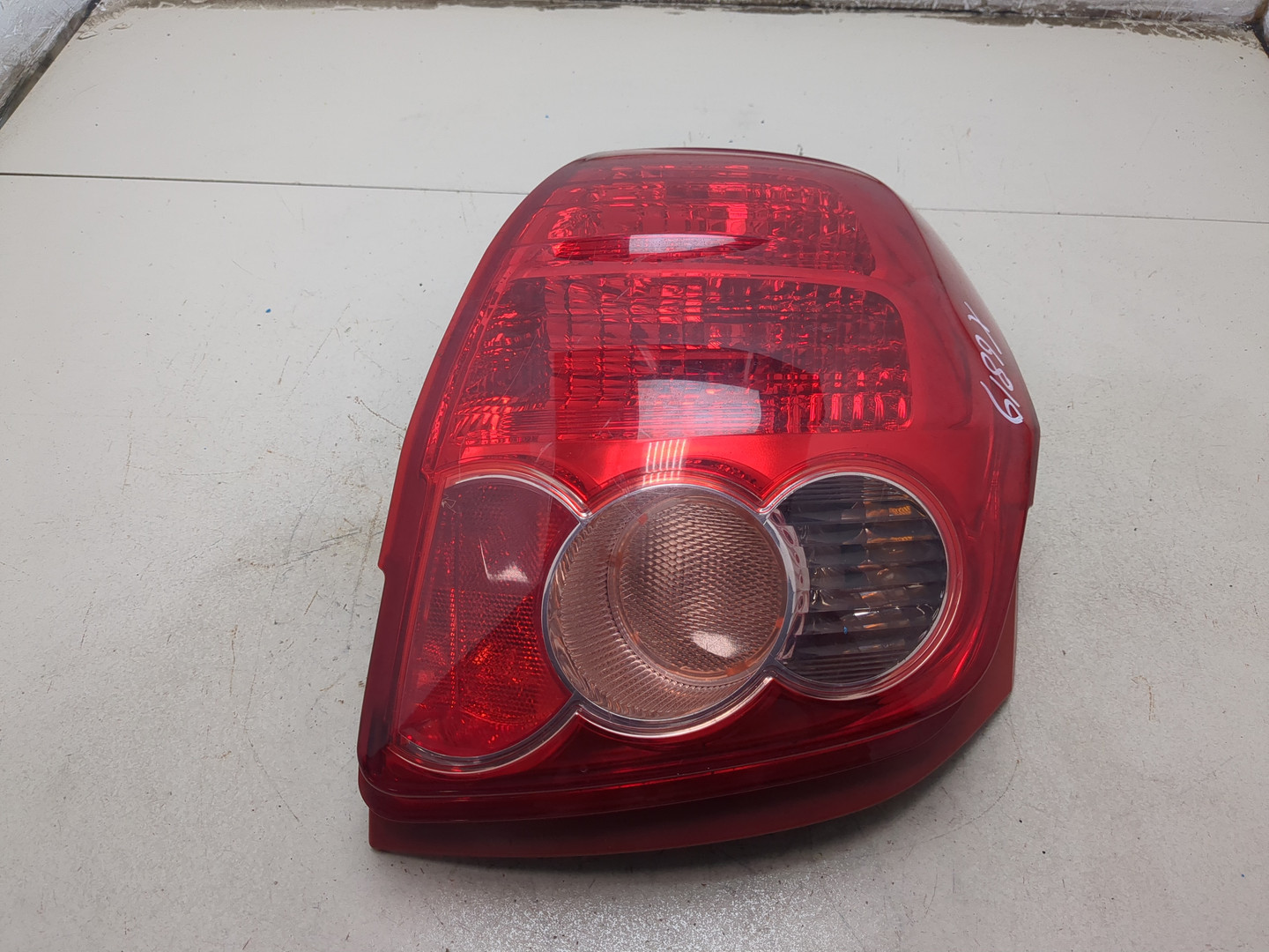 Фонарь задний левый