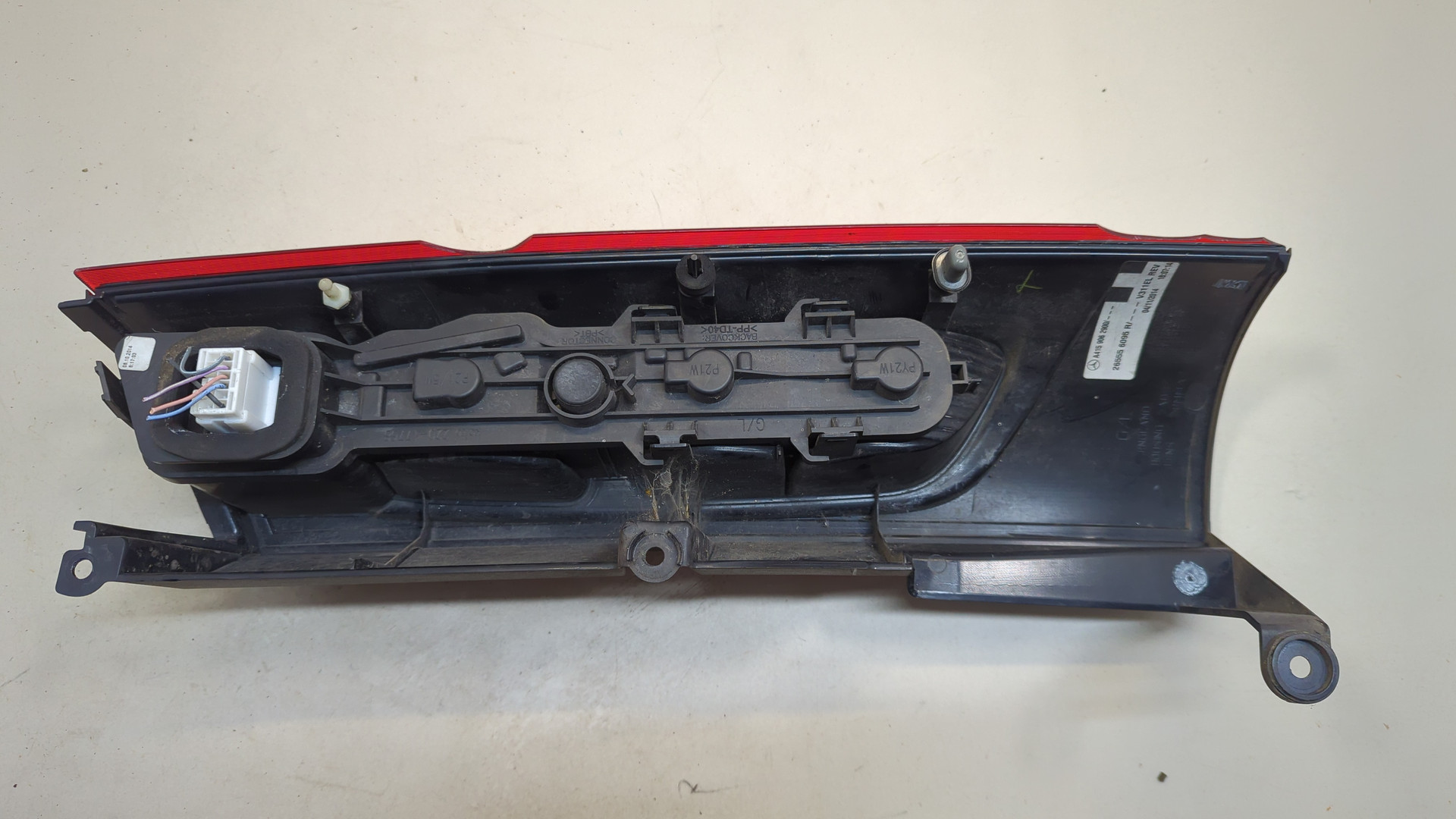 Фонарь задний левый