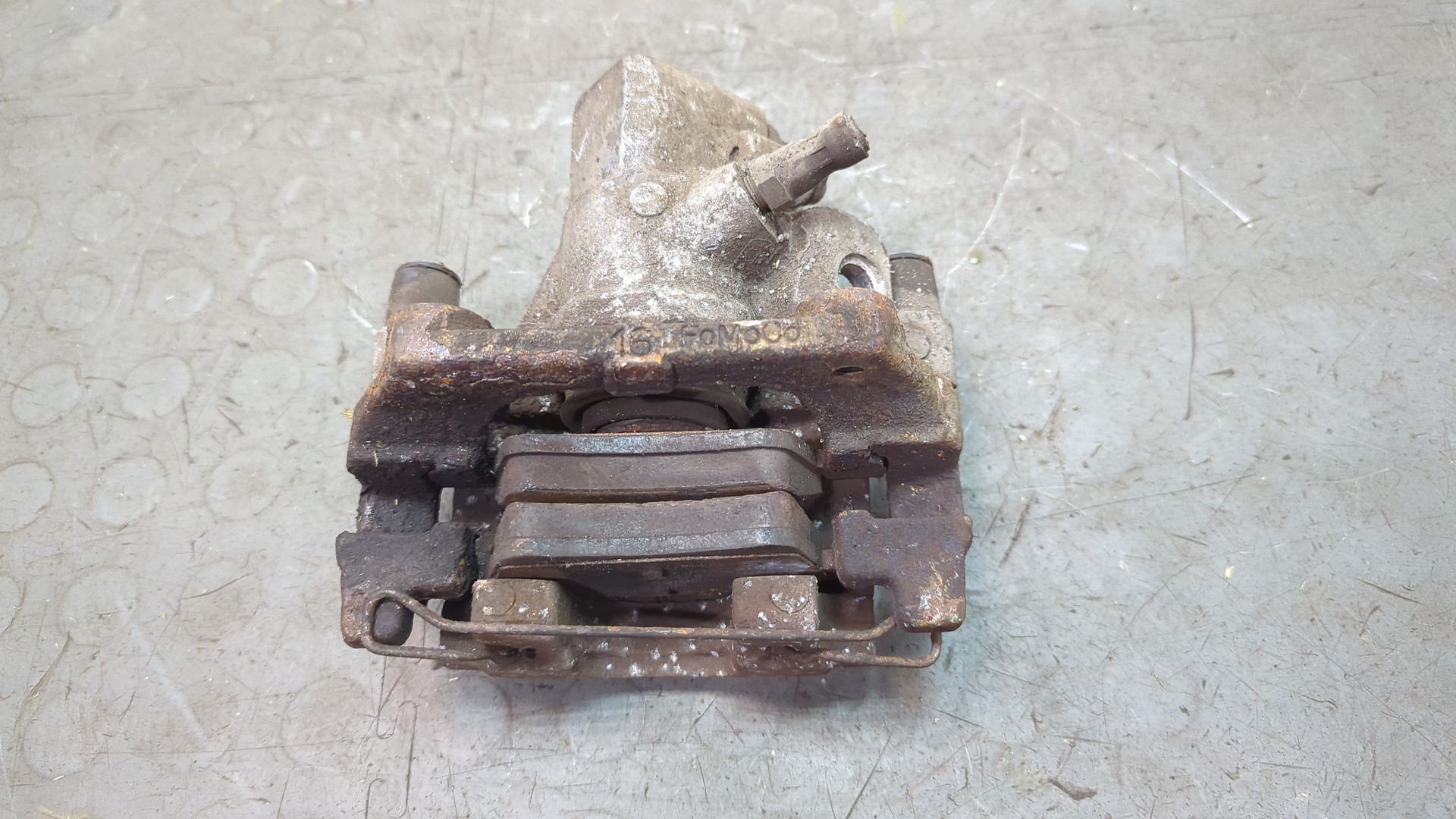 Суппорт задний левый