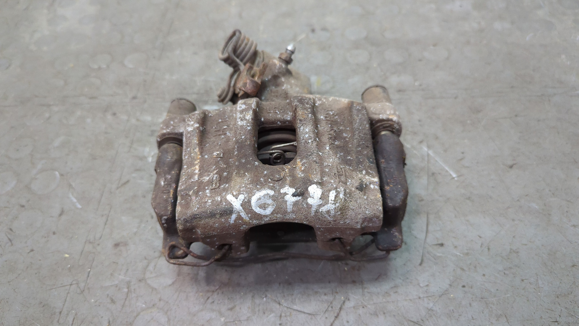 Суппорт задний левый