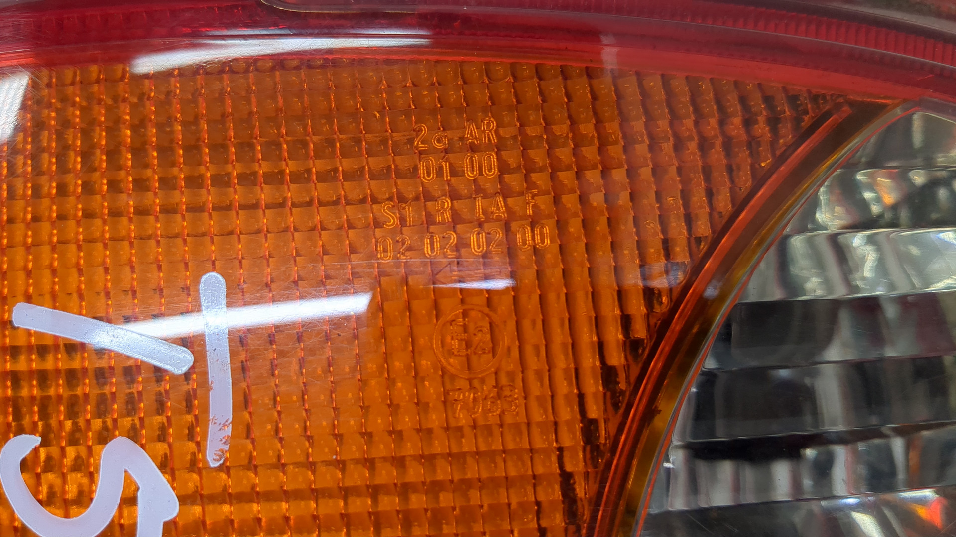 Фонарь задний левый