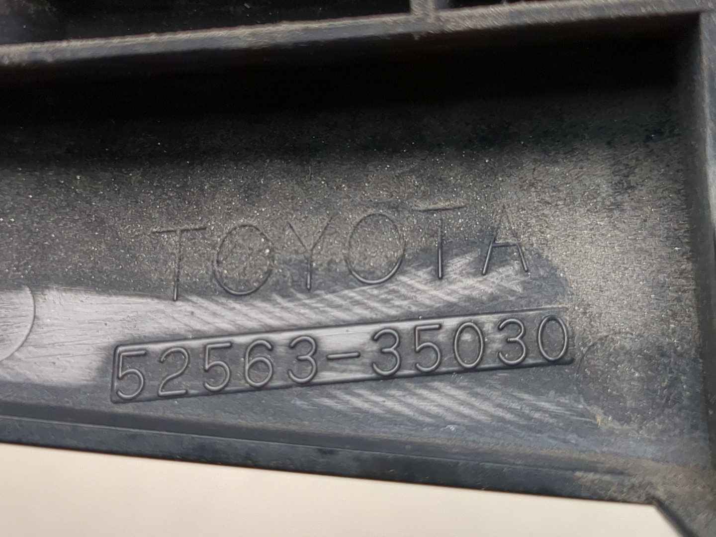 Кронштейн заднего бампера левый