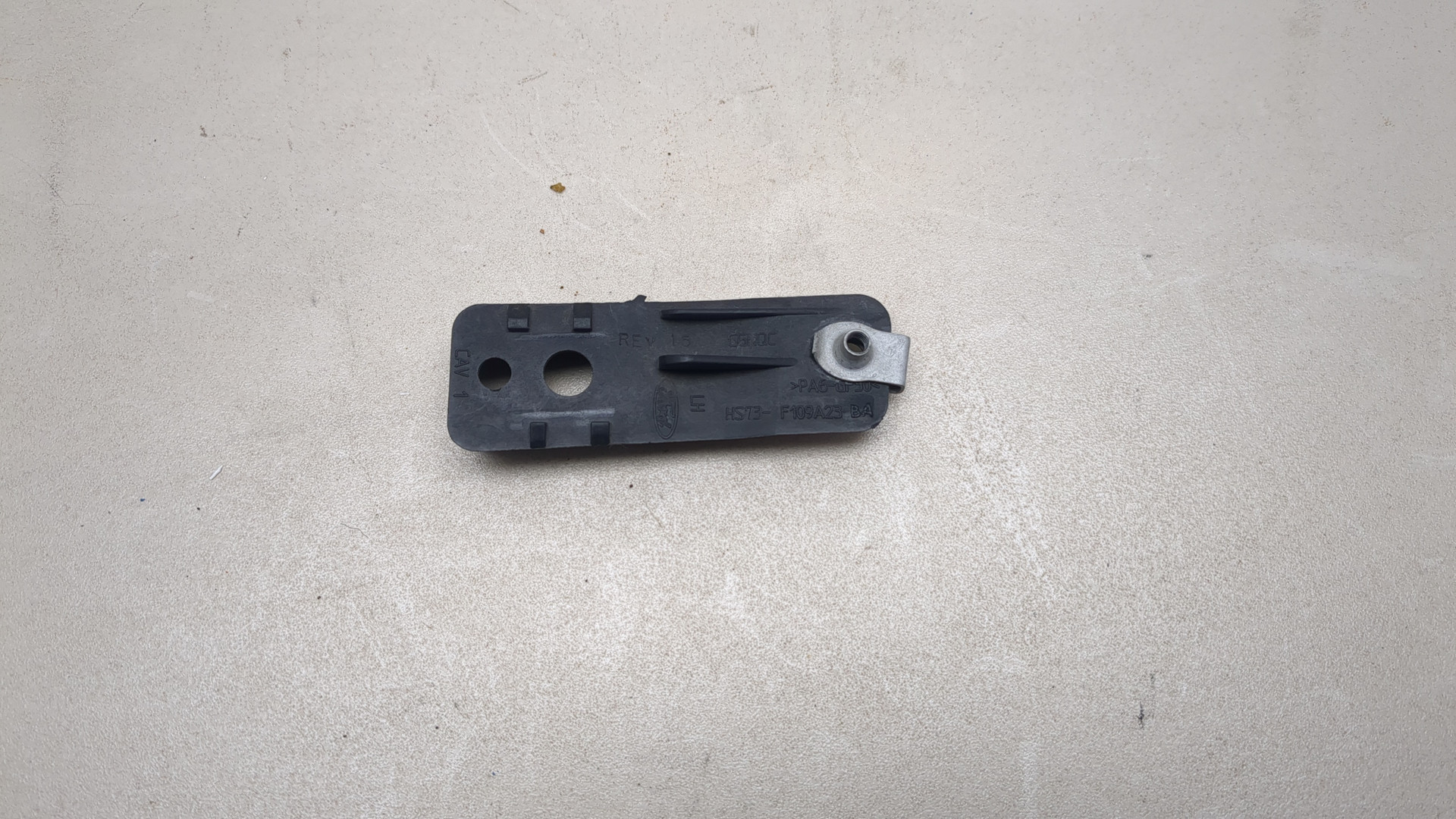 Кронштейн фар левый