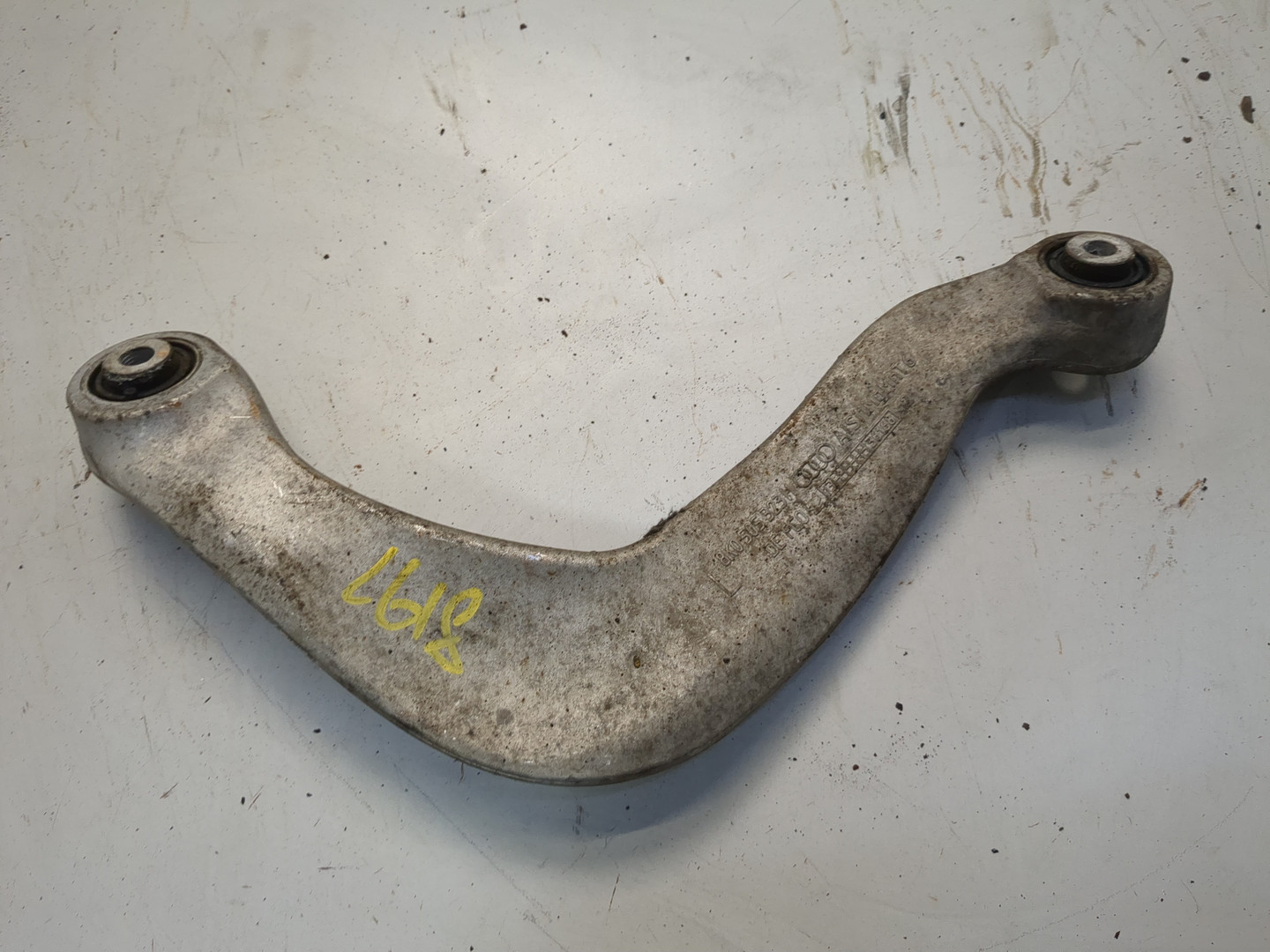 Рычаг задний левый