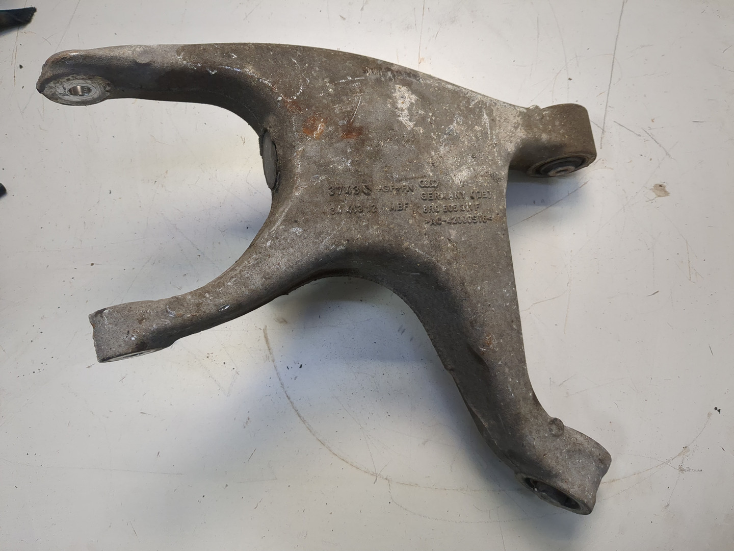 Рычаг задний левый