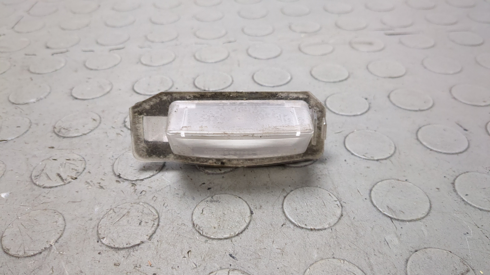 Фонарь подсветки номера