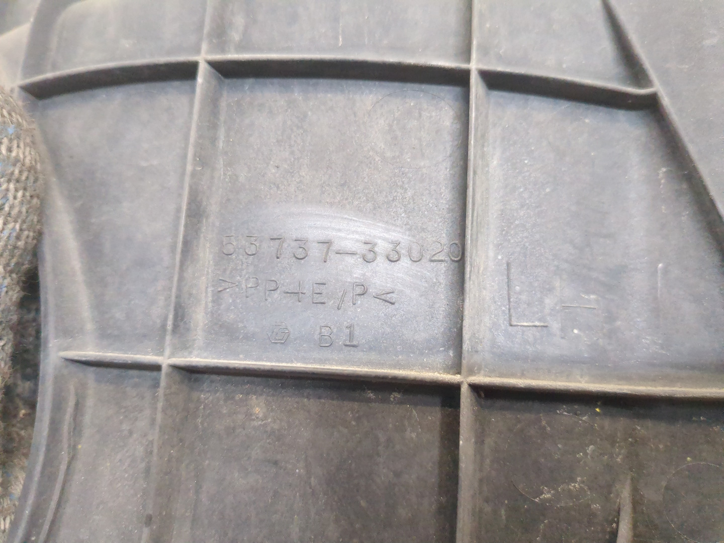 Брызговик передний левый