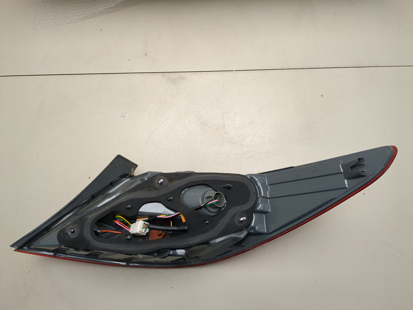 Фонарь задний левый