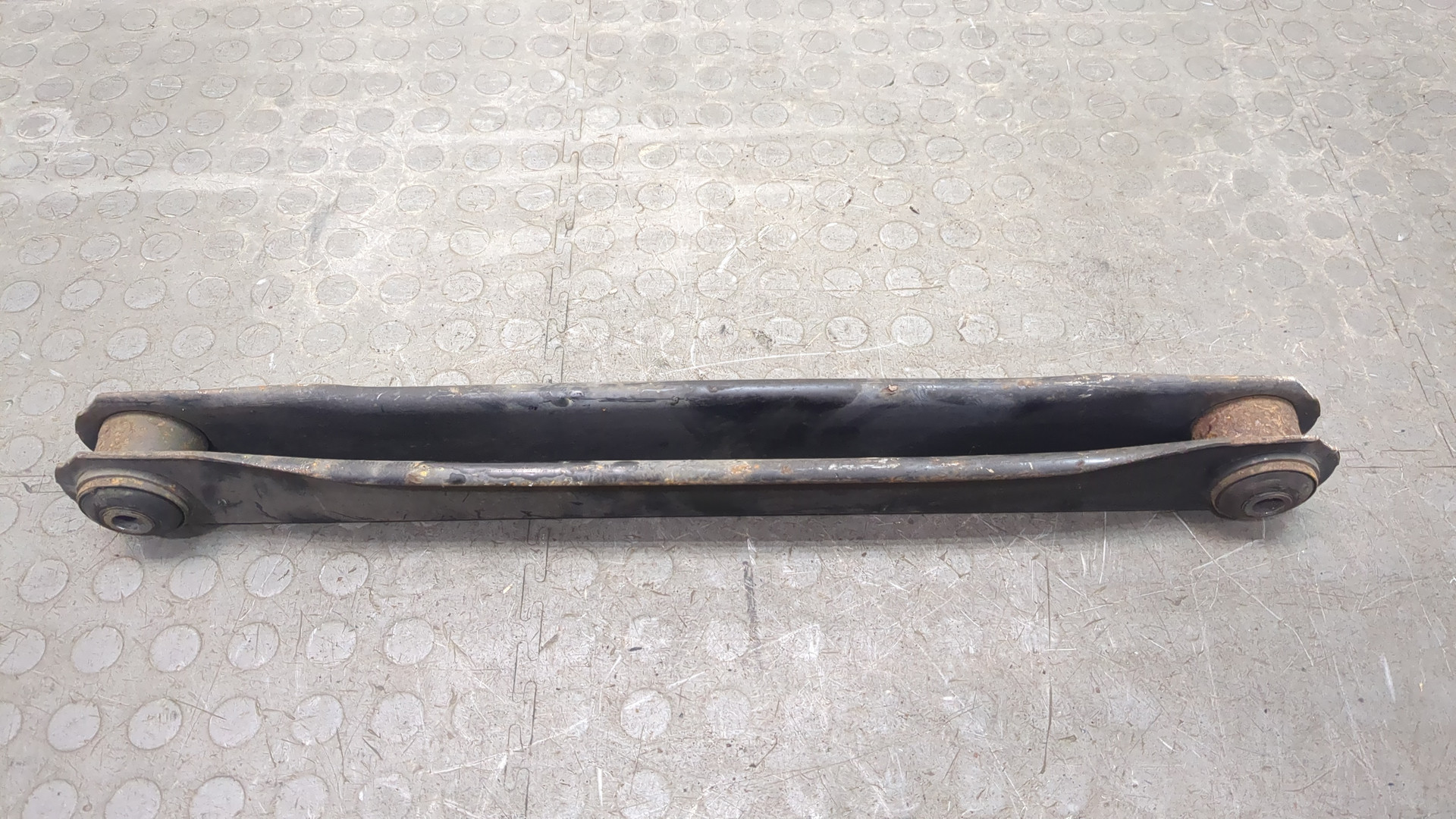 Рычаг задний