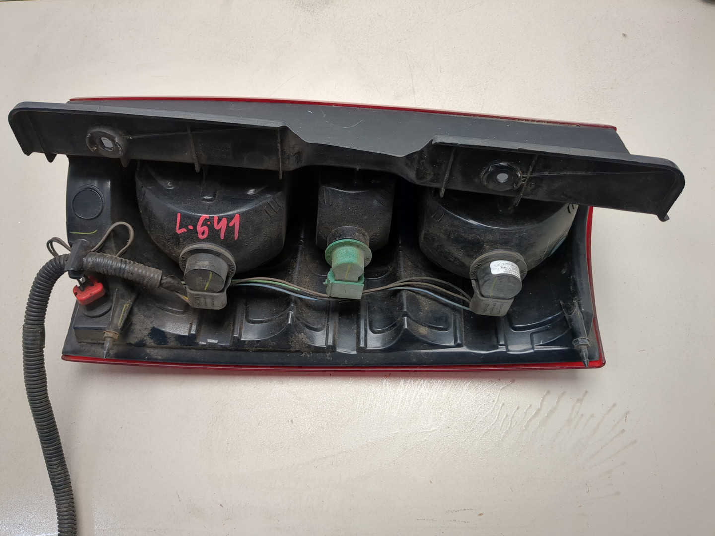 Фонарь задний левый