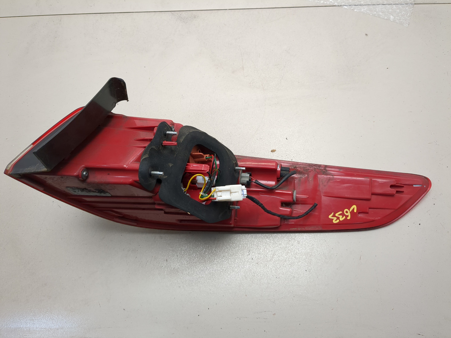 Фонарь задний левый