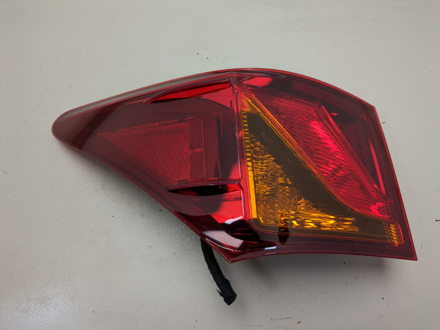 Фонарь задний левый