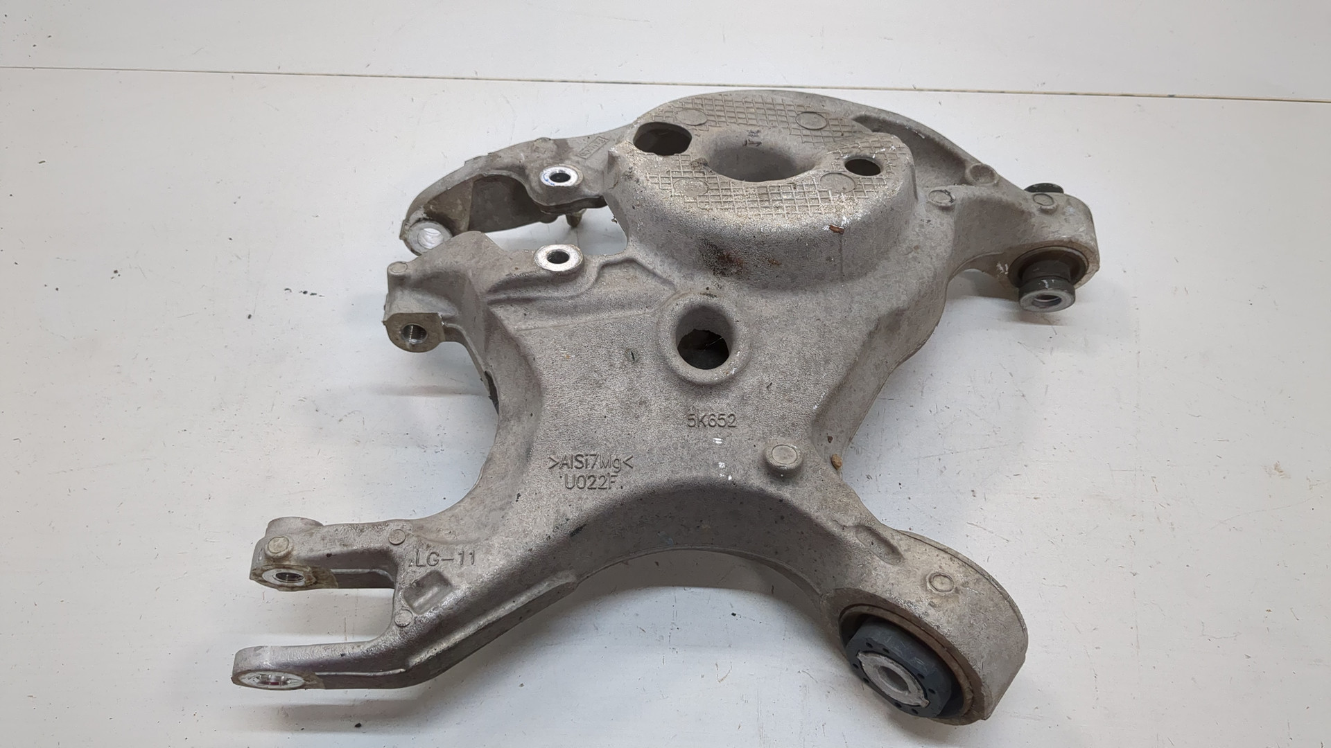 Рычаг задний левый