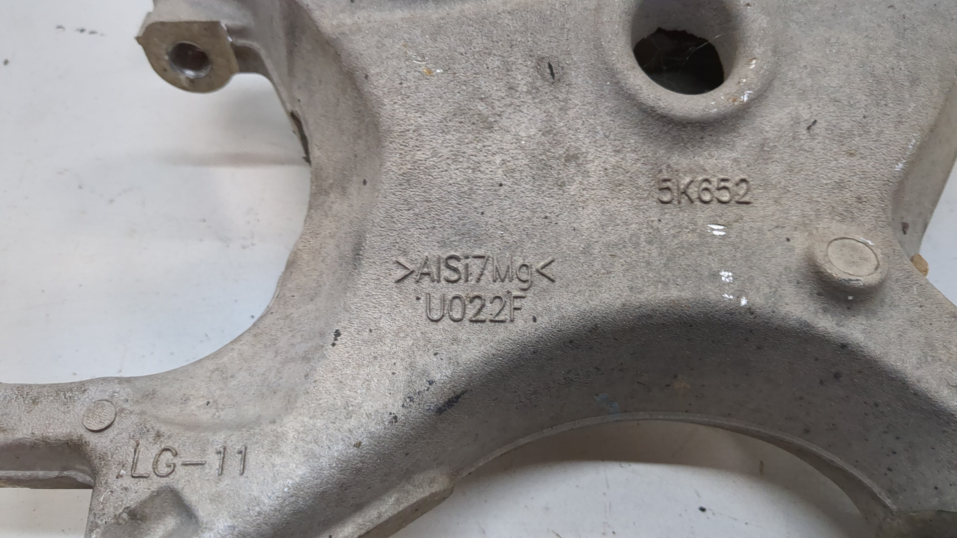 Рычаг задний левый