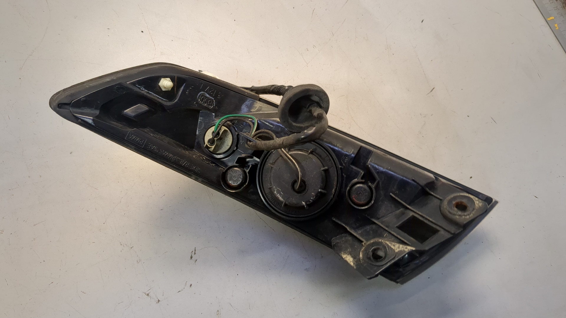 Фонарь задний левый