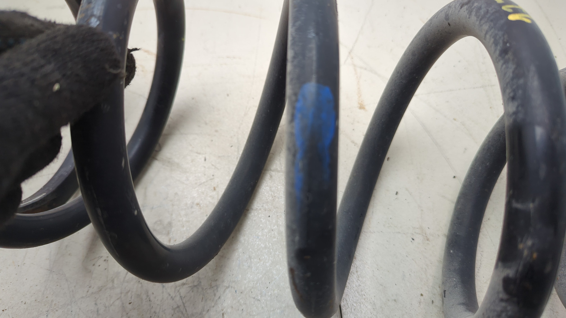 Пружина задняя