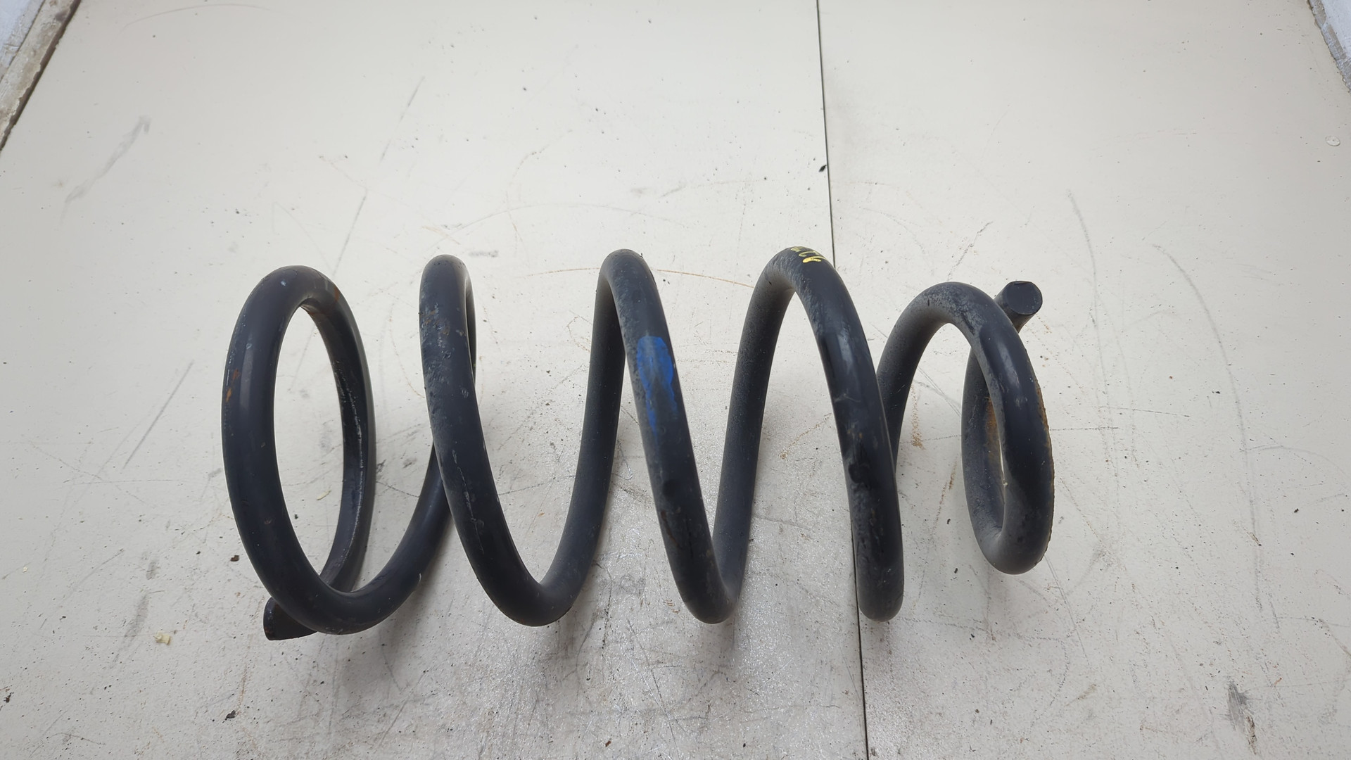 Пружина задняя