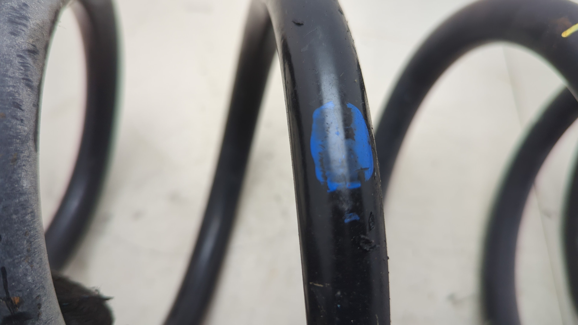 Пружина задняя