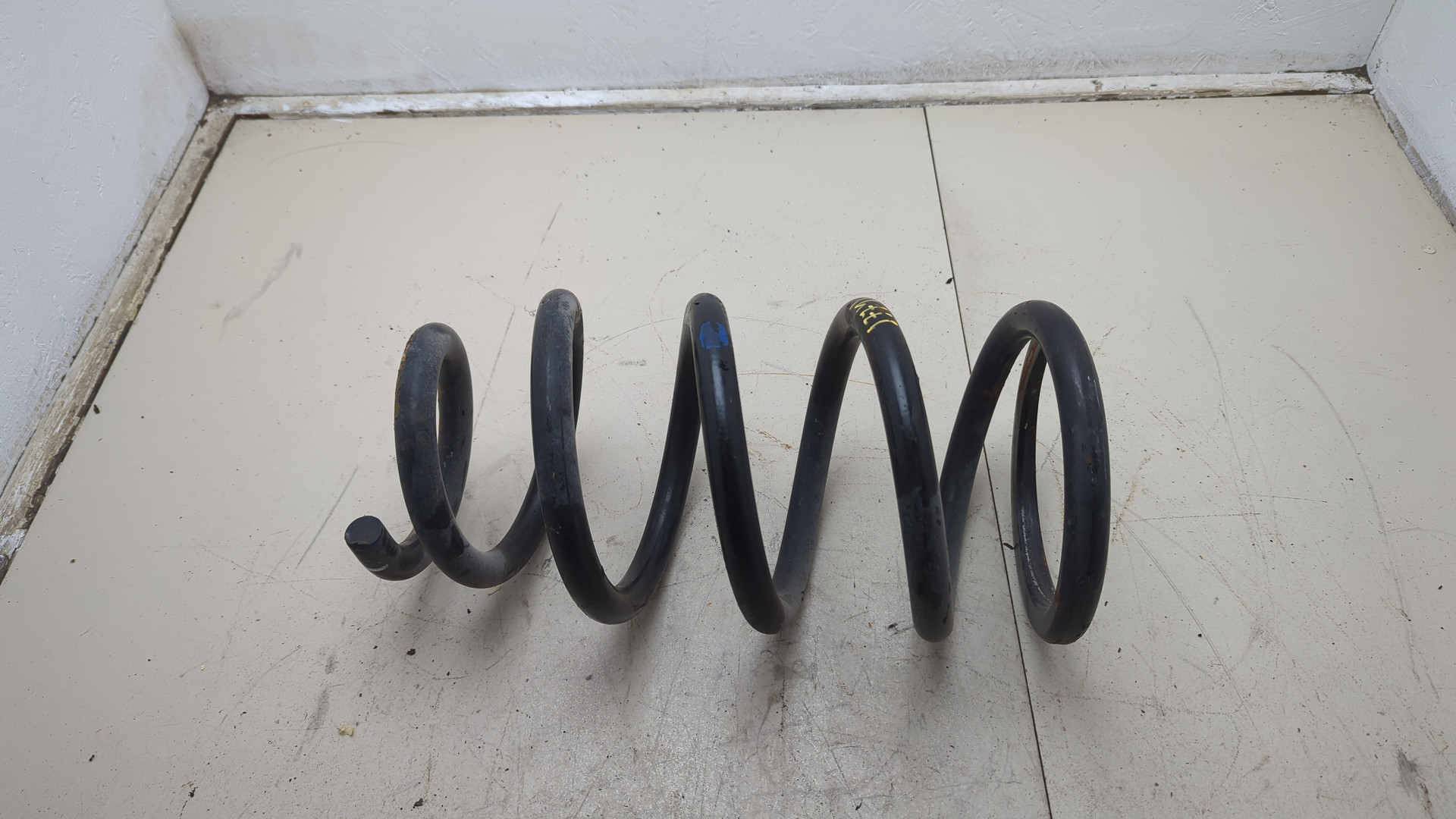 Пружина задняя