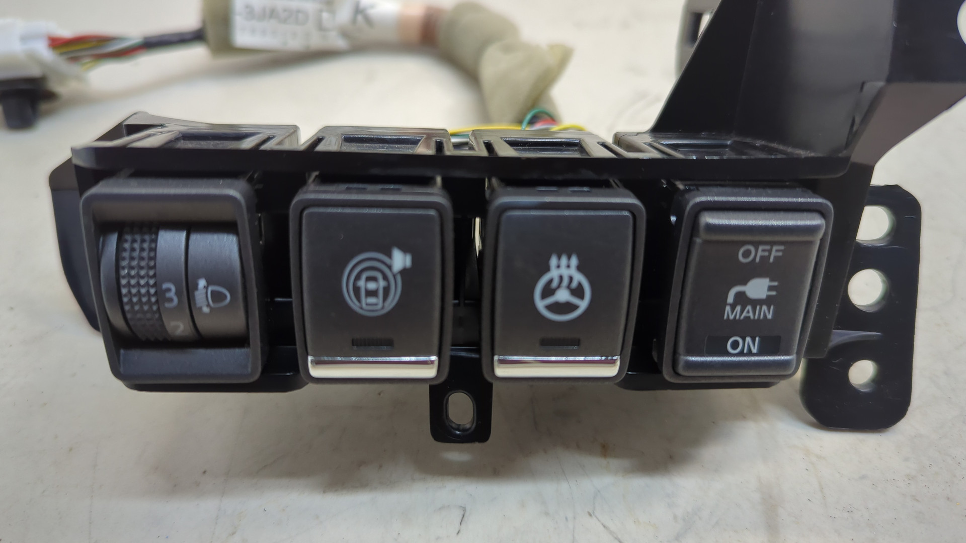 Кнопка корректора фар