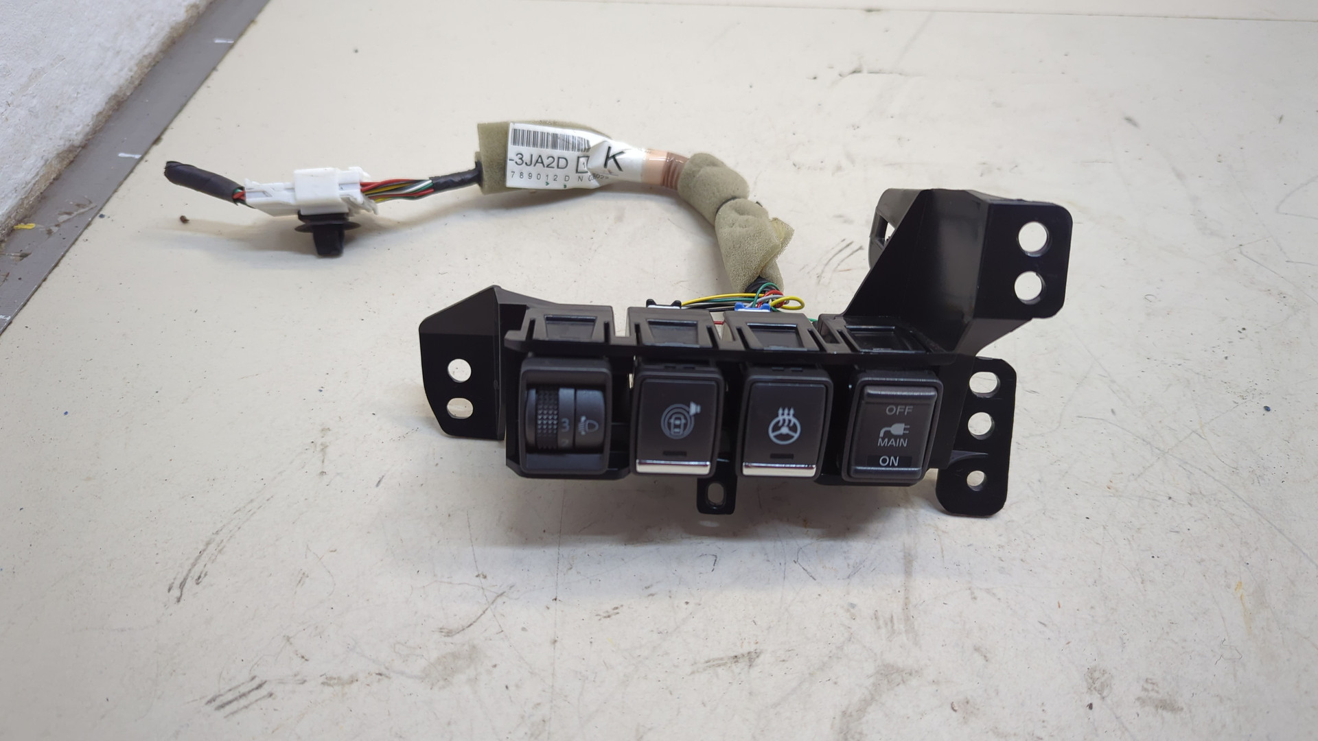 Кнопка корректора фар