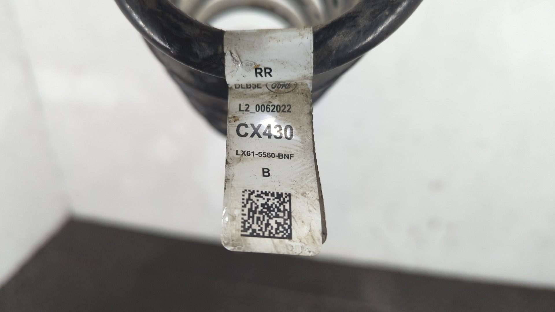 Пружина задняя