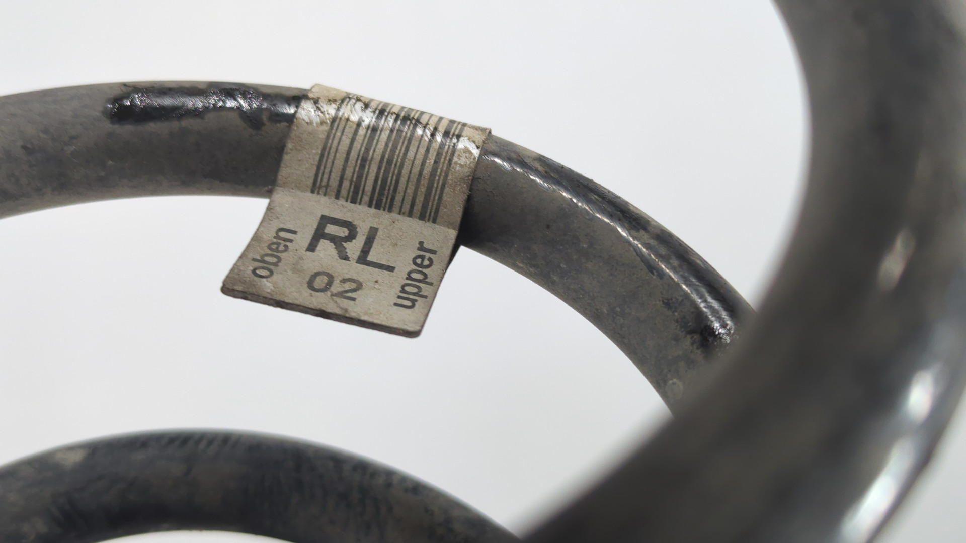 Пружина задняя