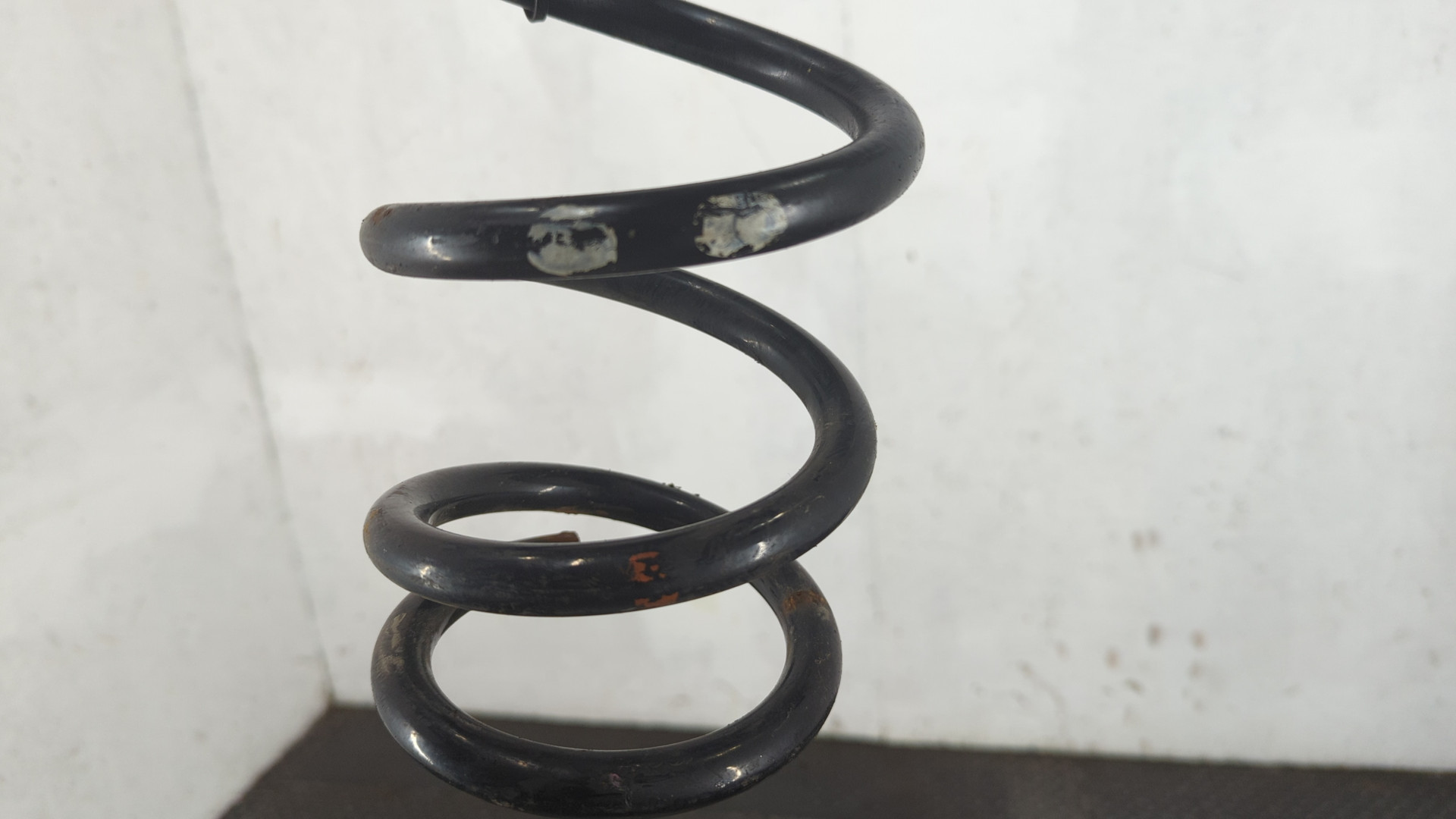 Пружина задняя