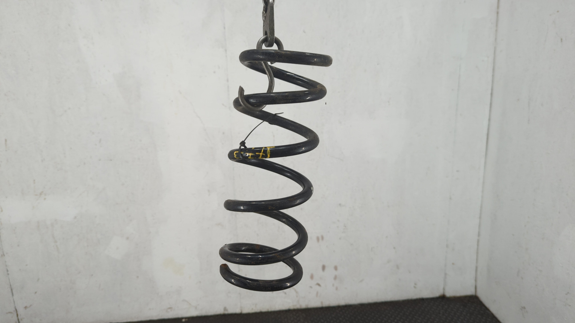 Пружина задняя