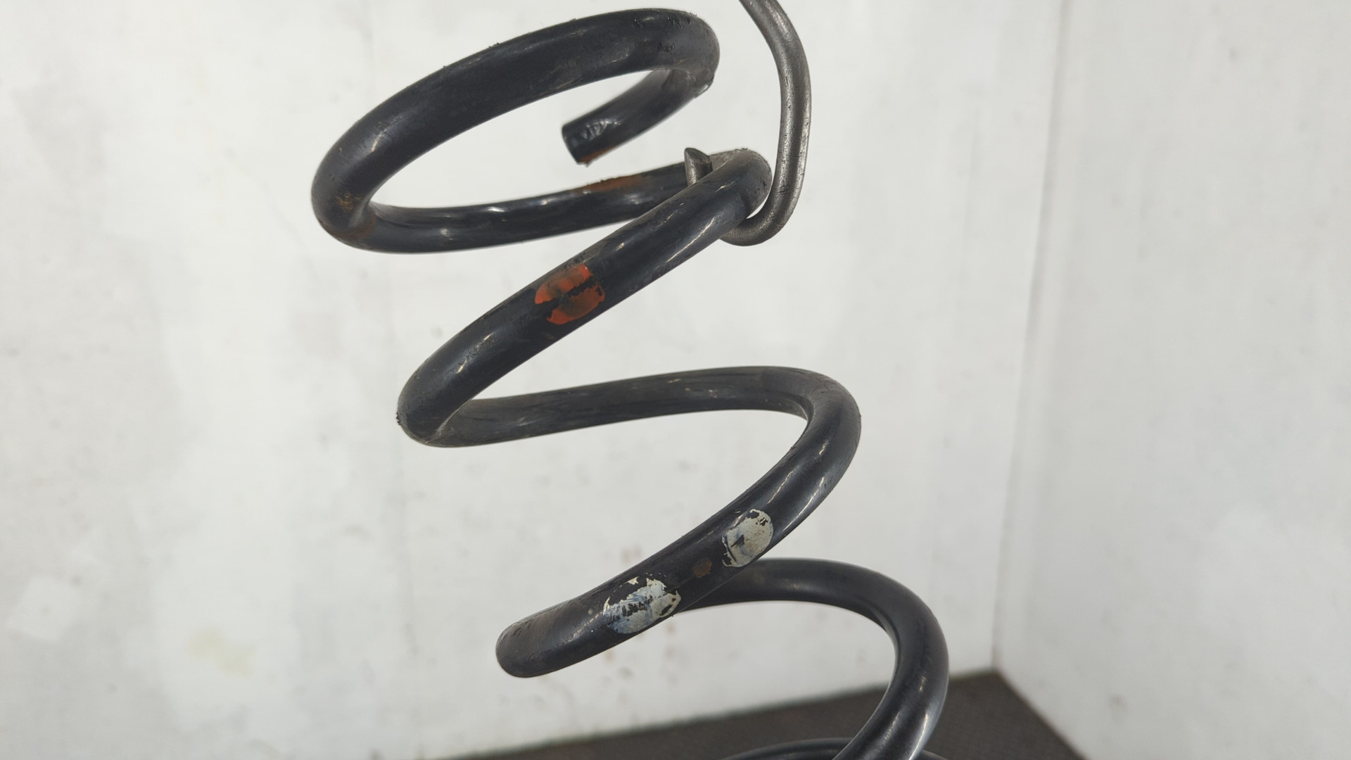 Пружина задняя