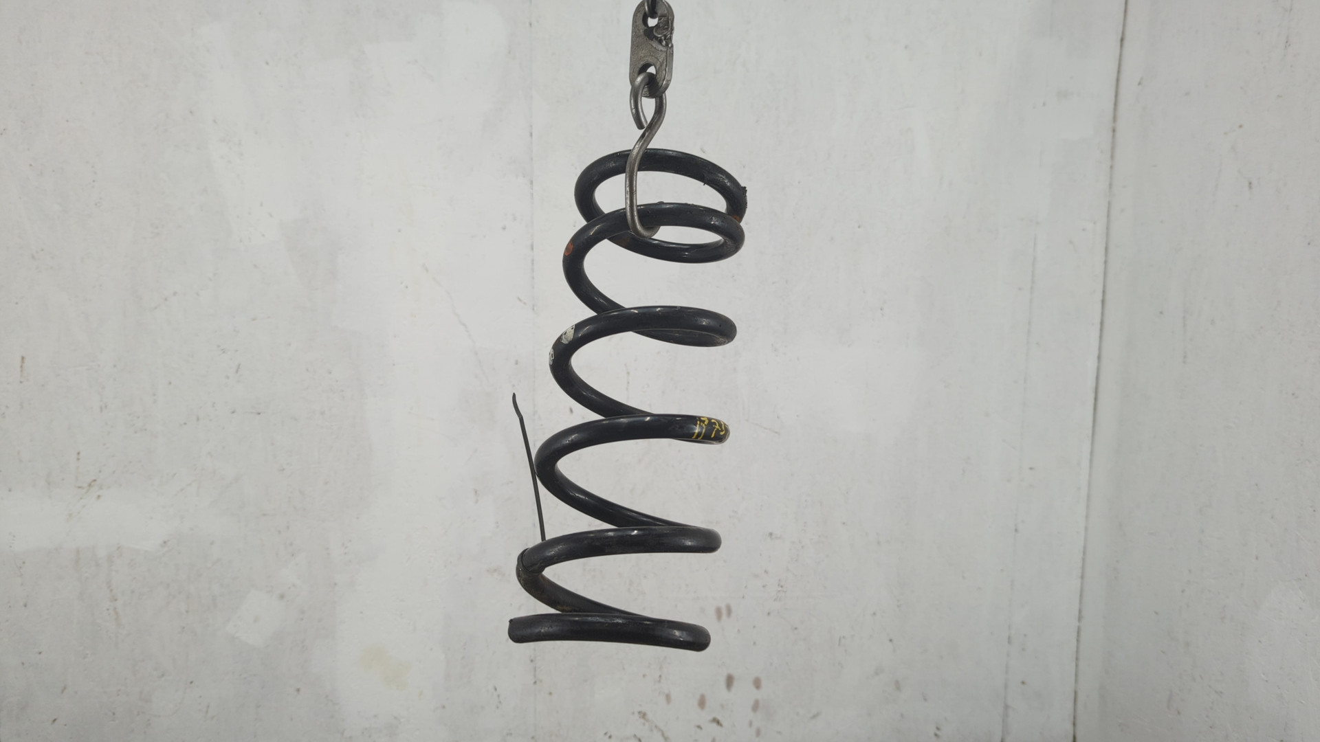 Пружина задняя