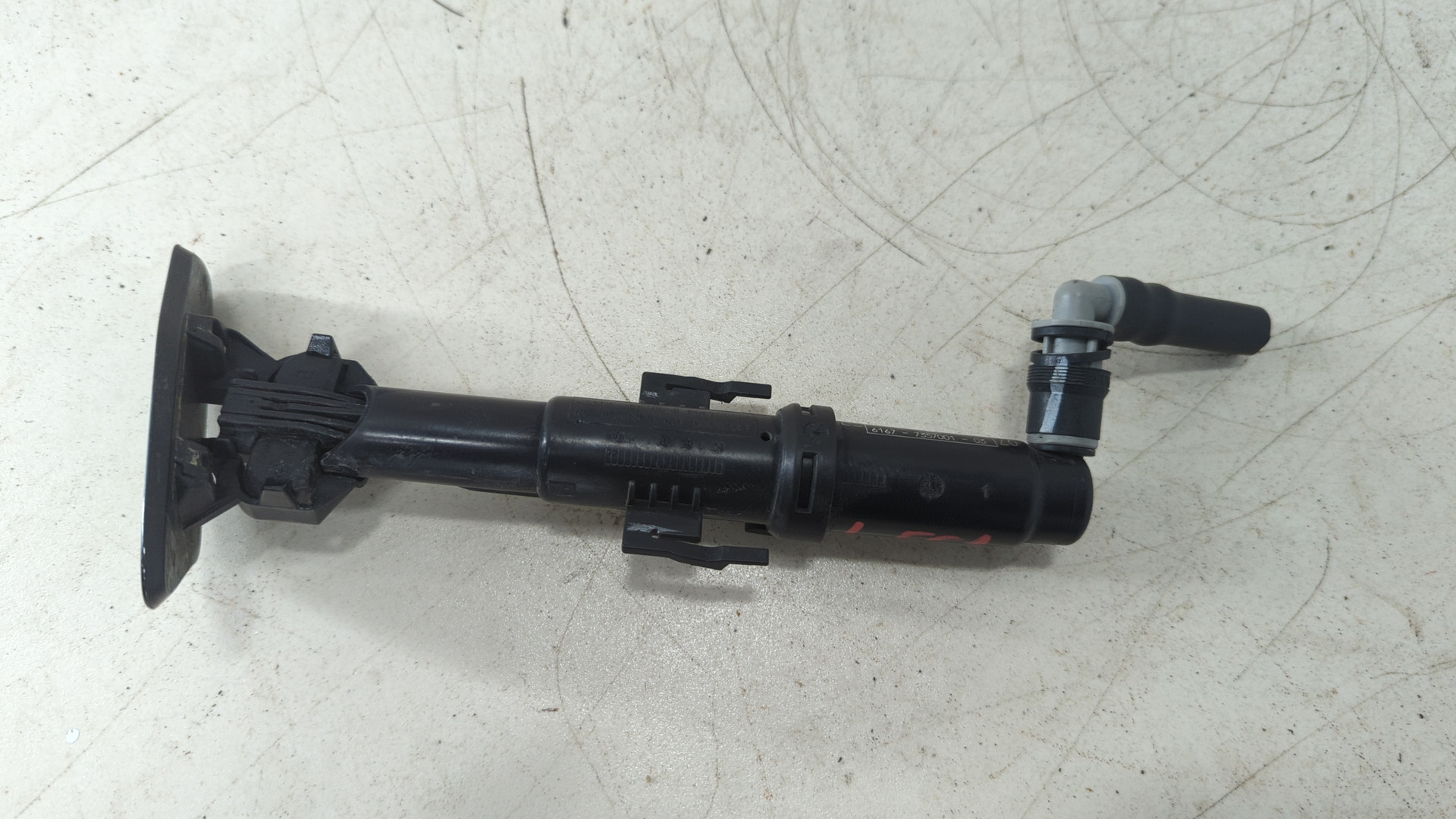 Форсунка омывателя фары