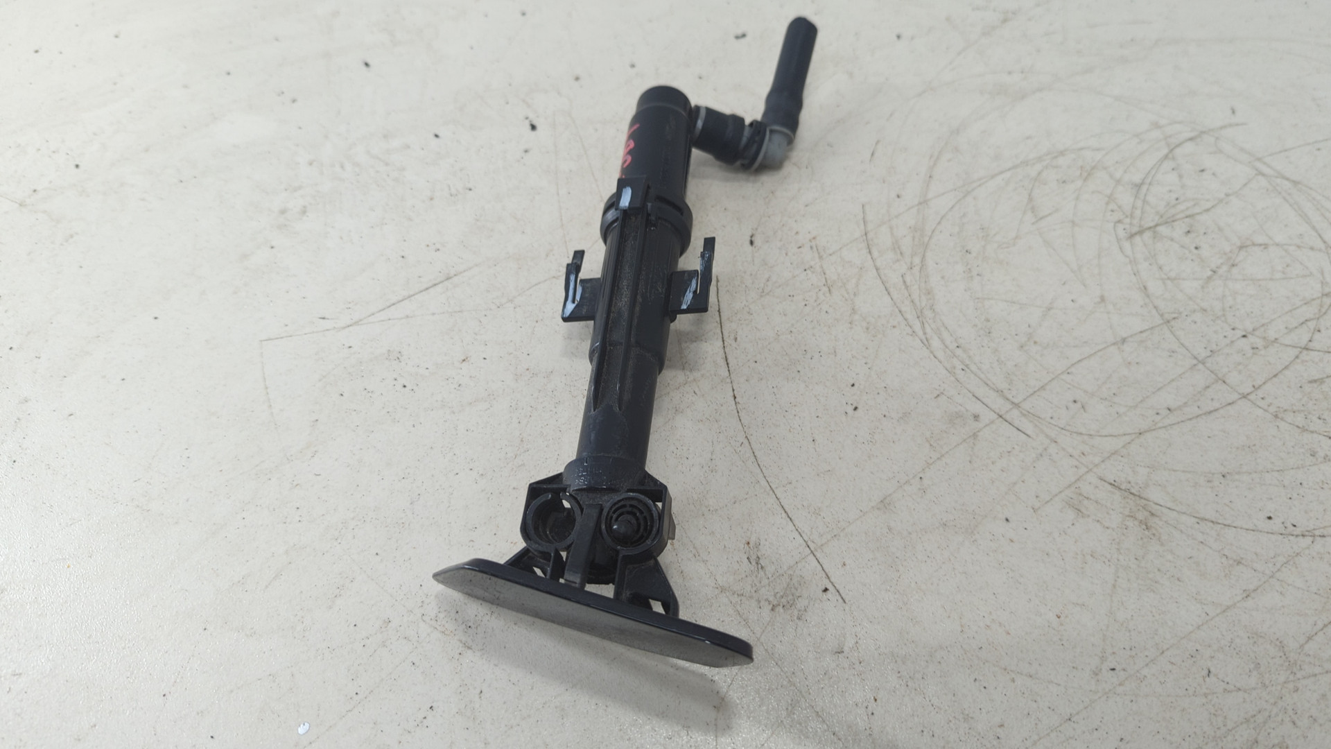 Форсунка омывателя фары