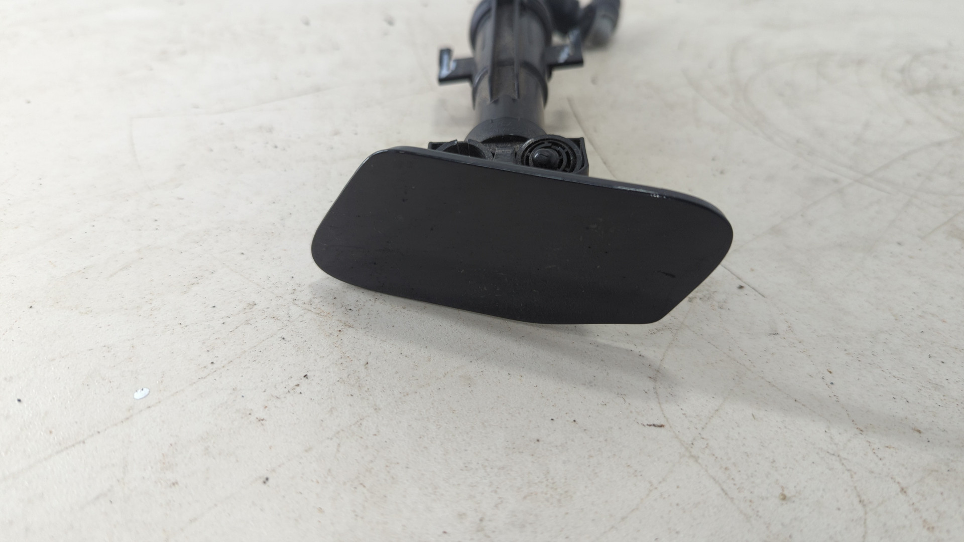 Форсунка омывателя фары