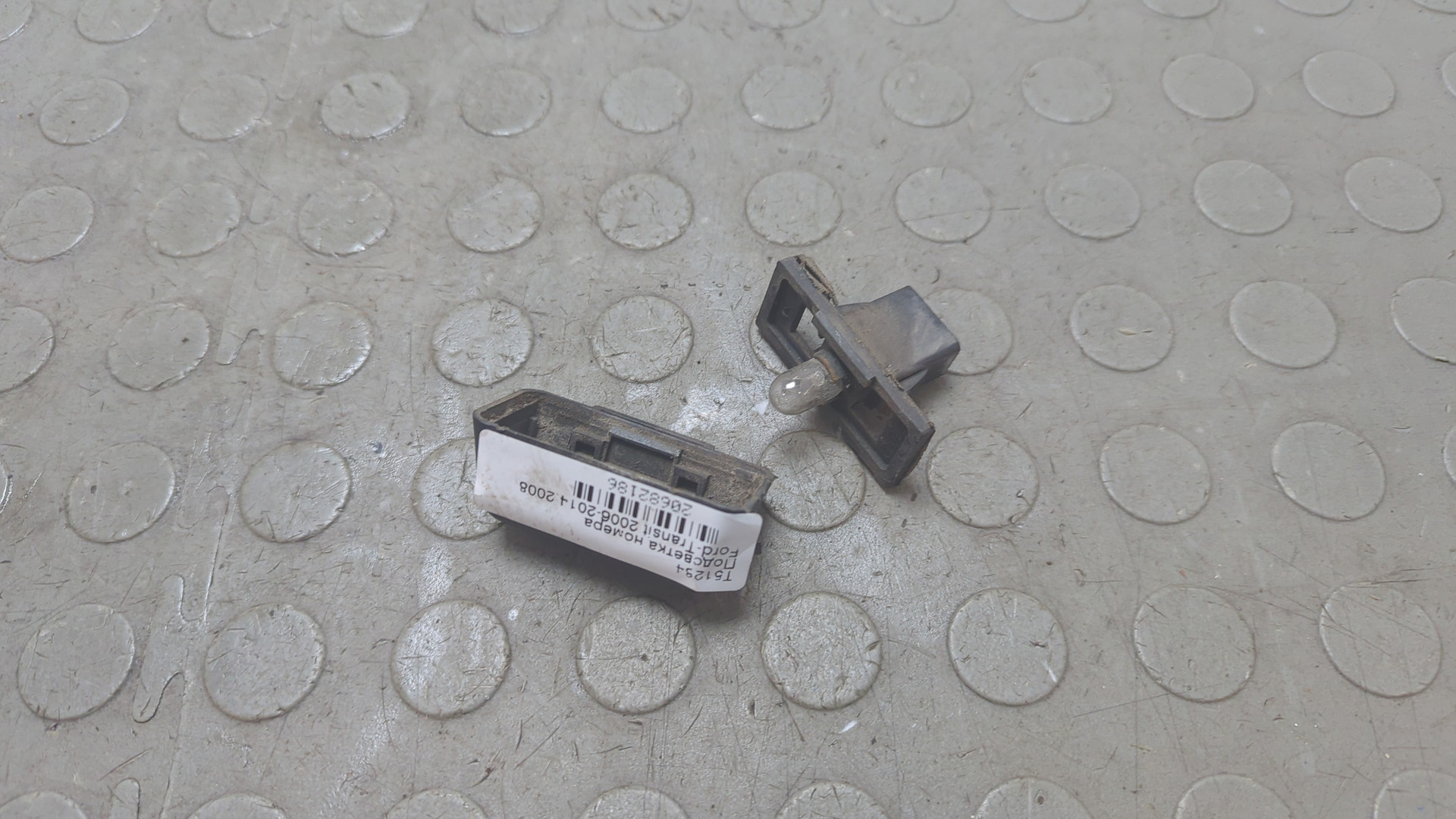 Фонарь подсветки номера