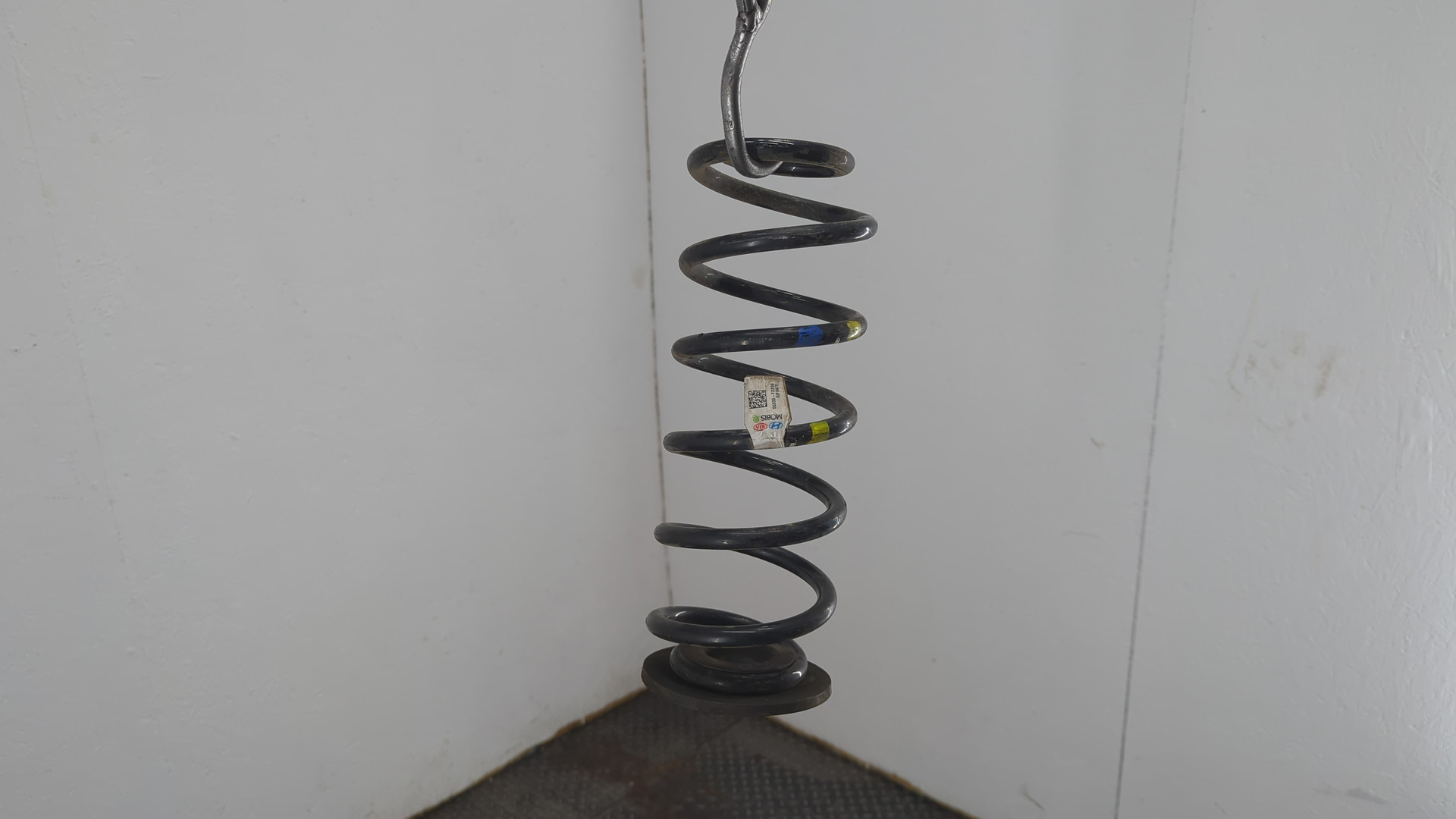 Пружина задняя