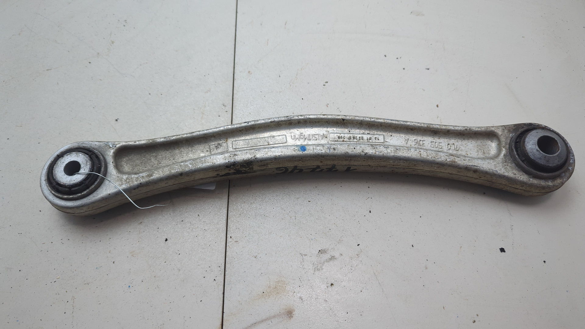 Рычаг задний левый