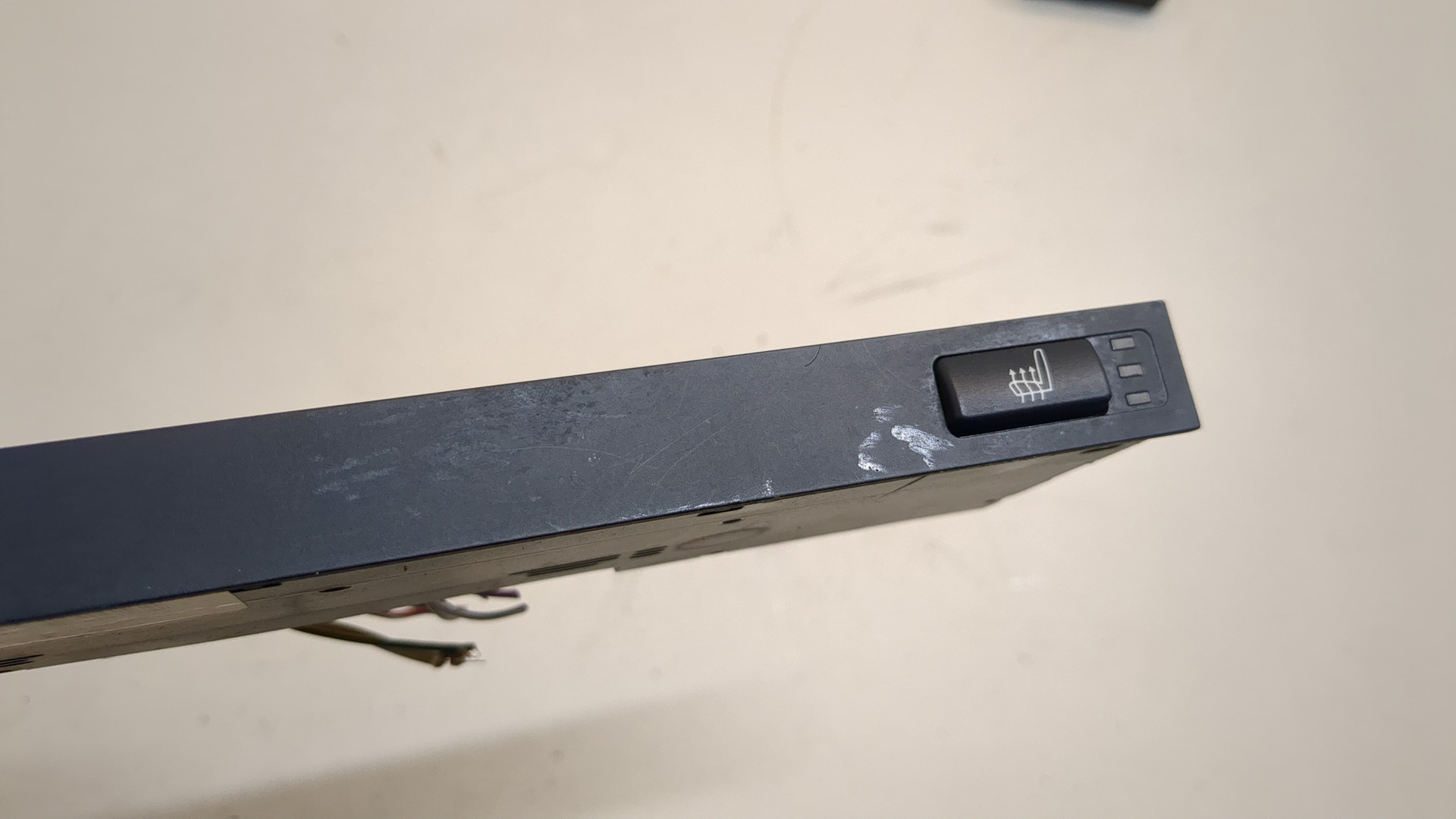 Кнопка обогрева сидений