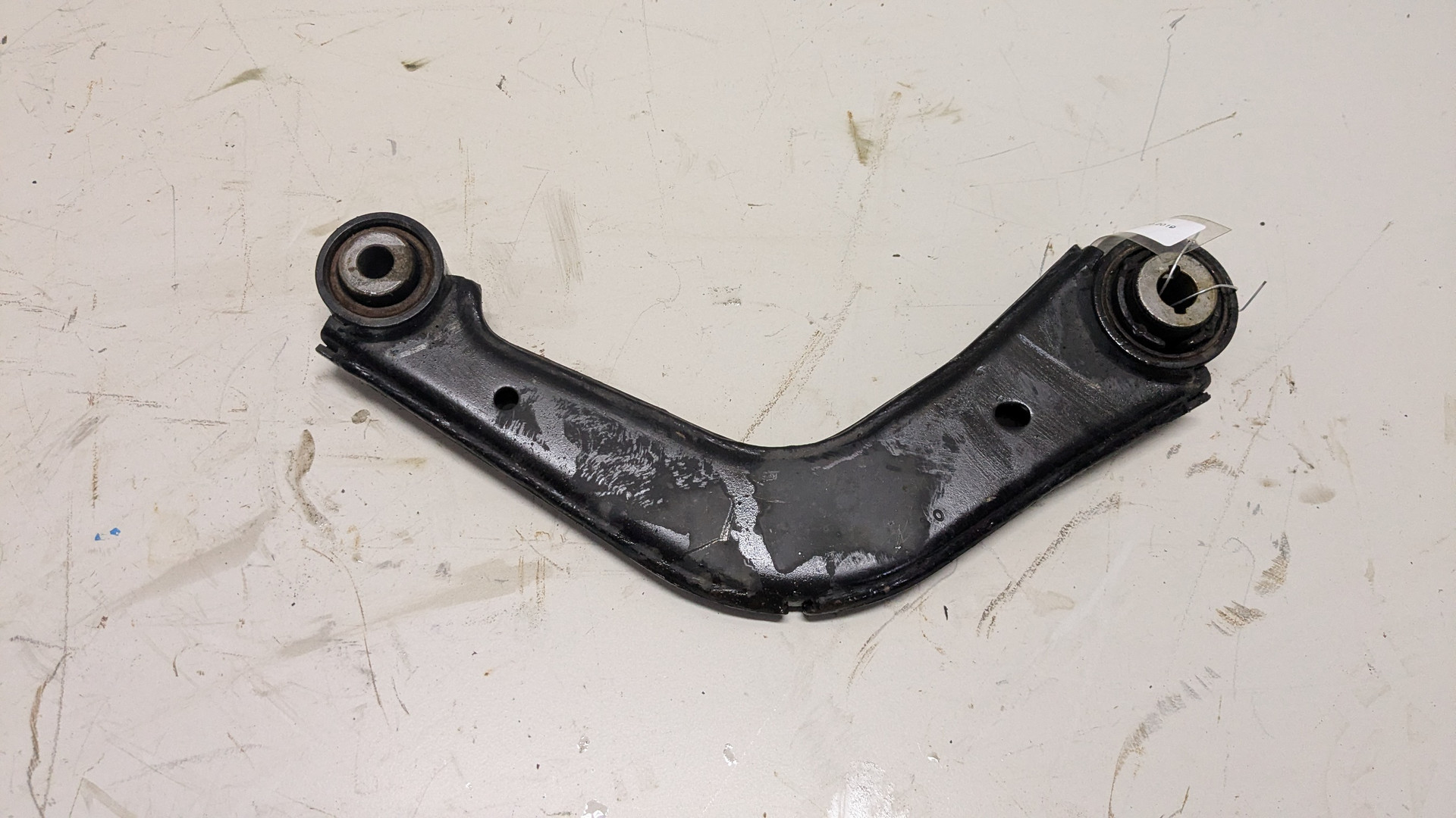 Рычаг задний левый