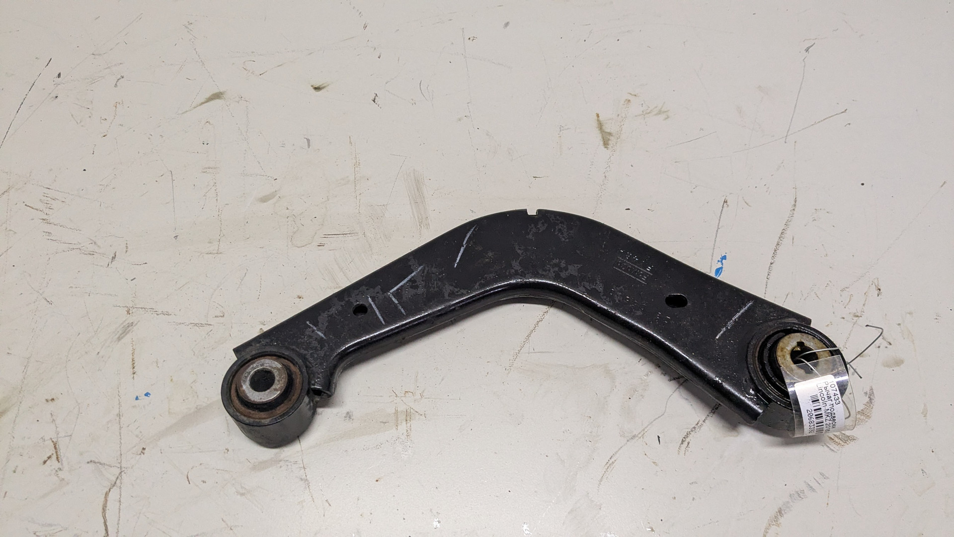 Рычаг задний левый