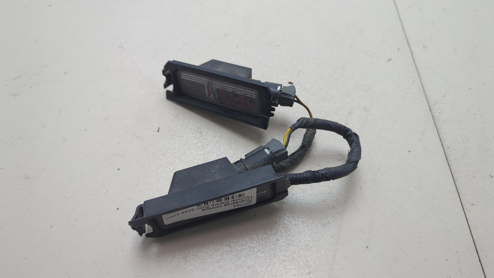 Фонарь подсветки номера