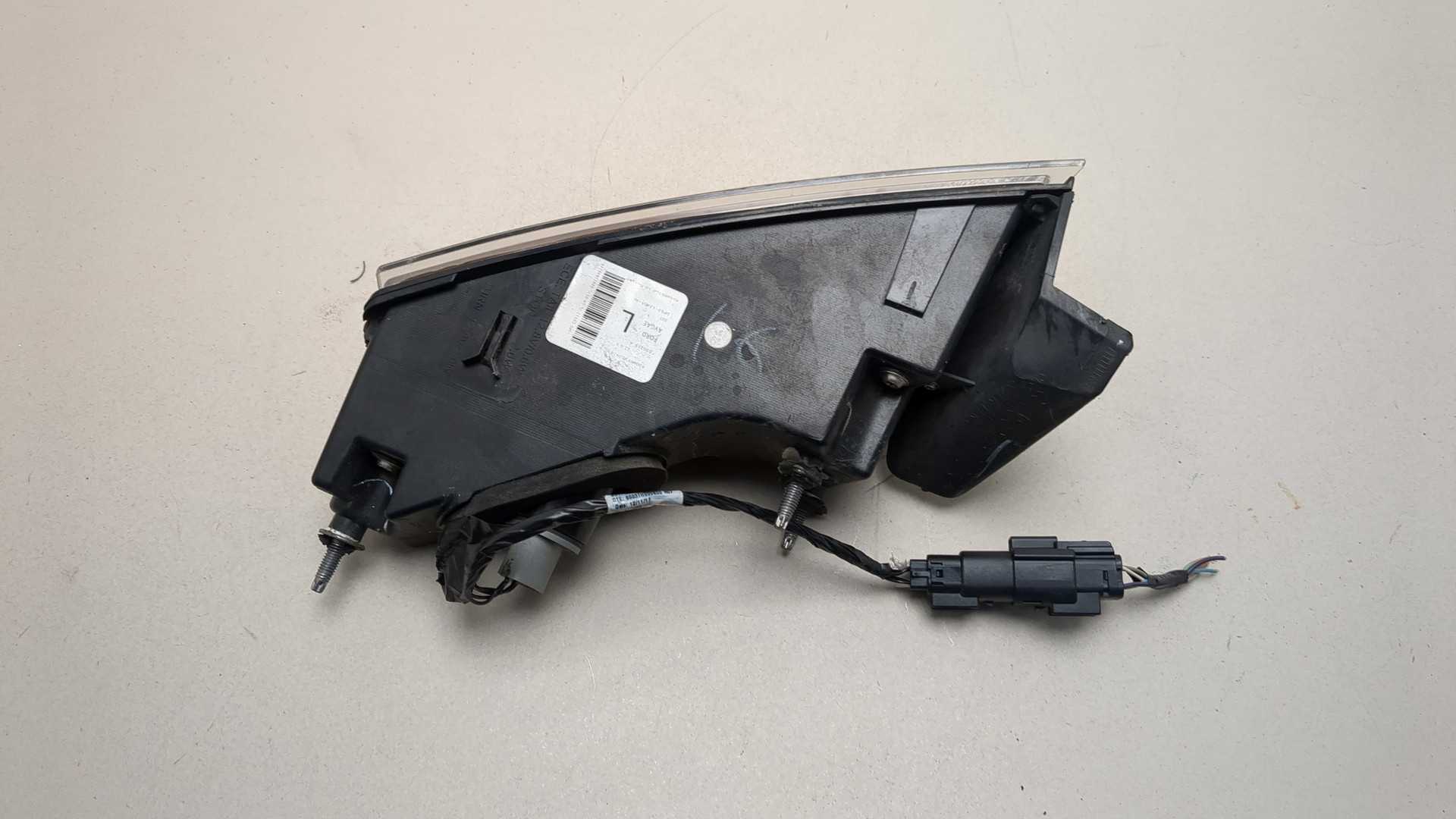 Фонарь задний левый