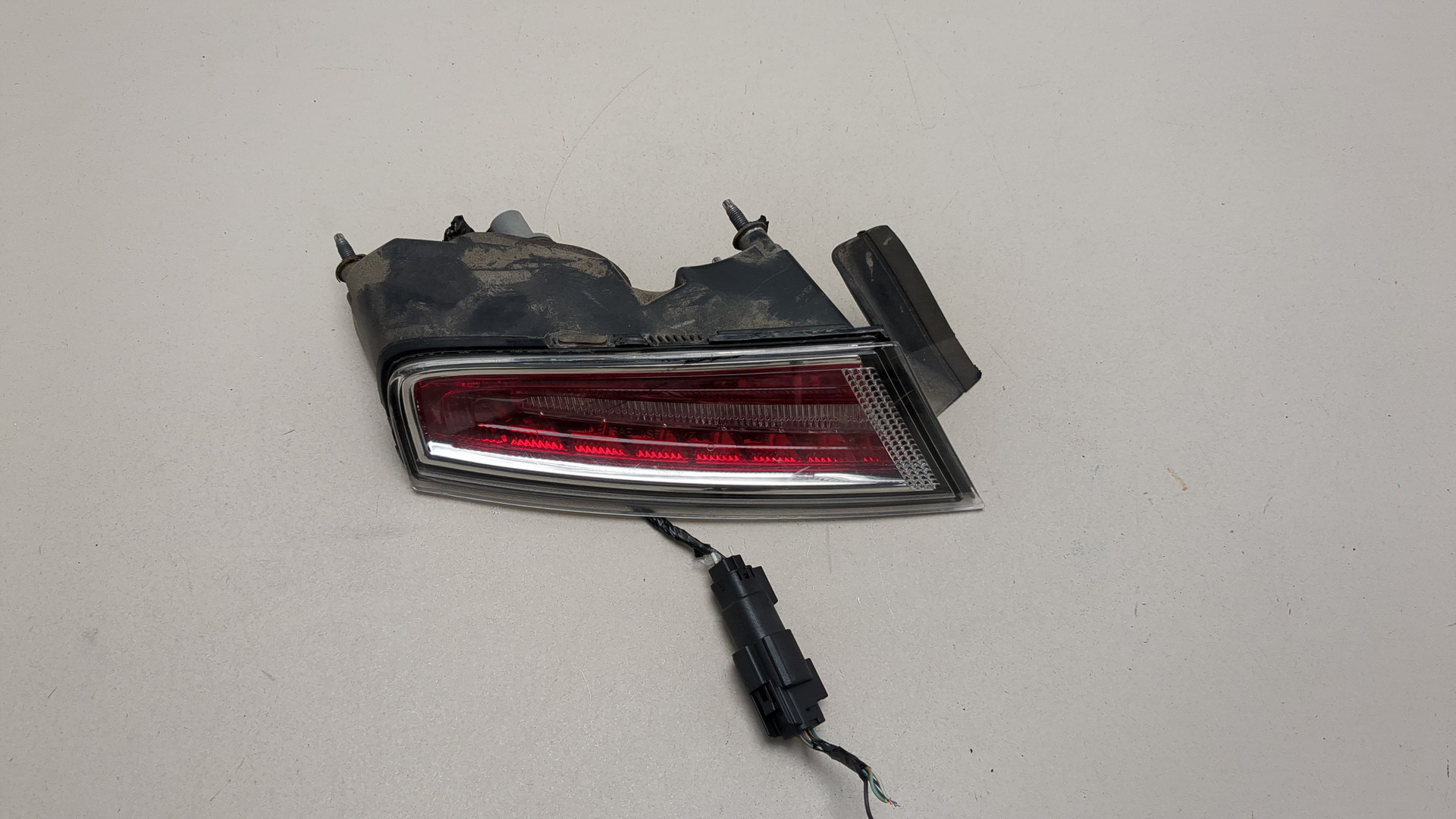 Фонарь задний левый