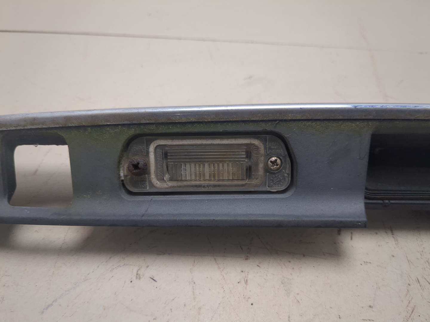 Фонарь подсветки номера