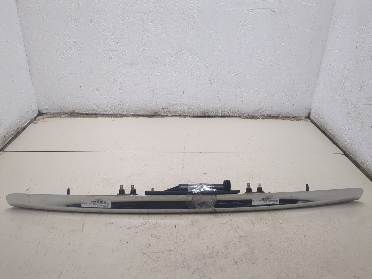 Фонарь подсветки номера