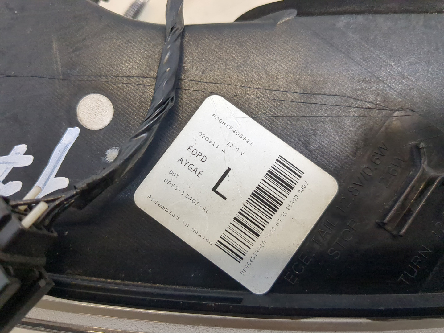 Фонарь задний левый