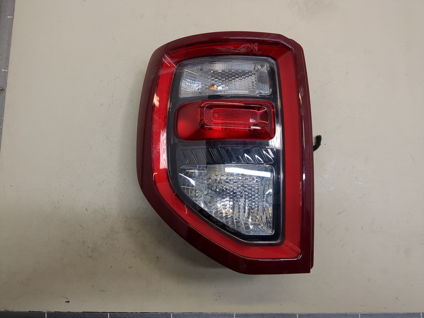 Фонарь задний левый