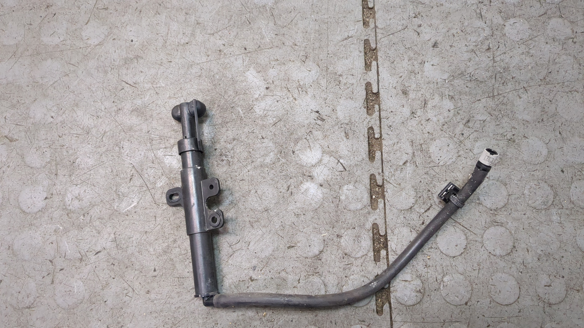 Форсунка омывателя фары